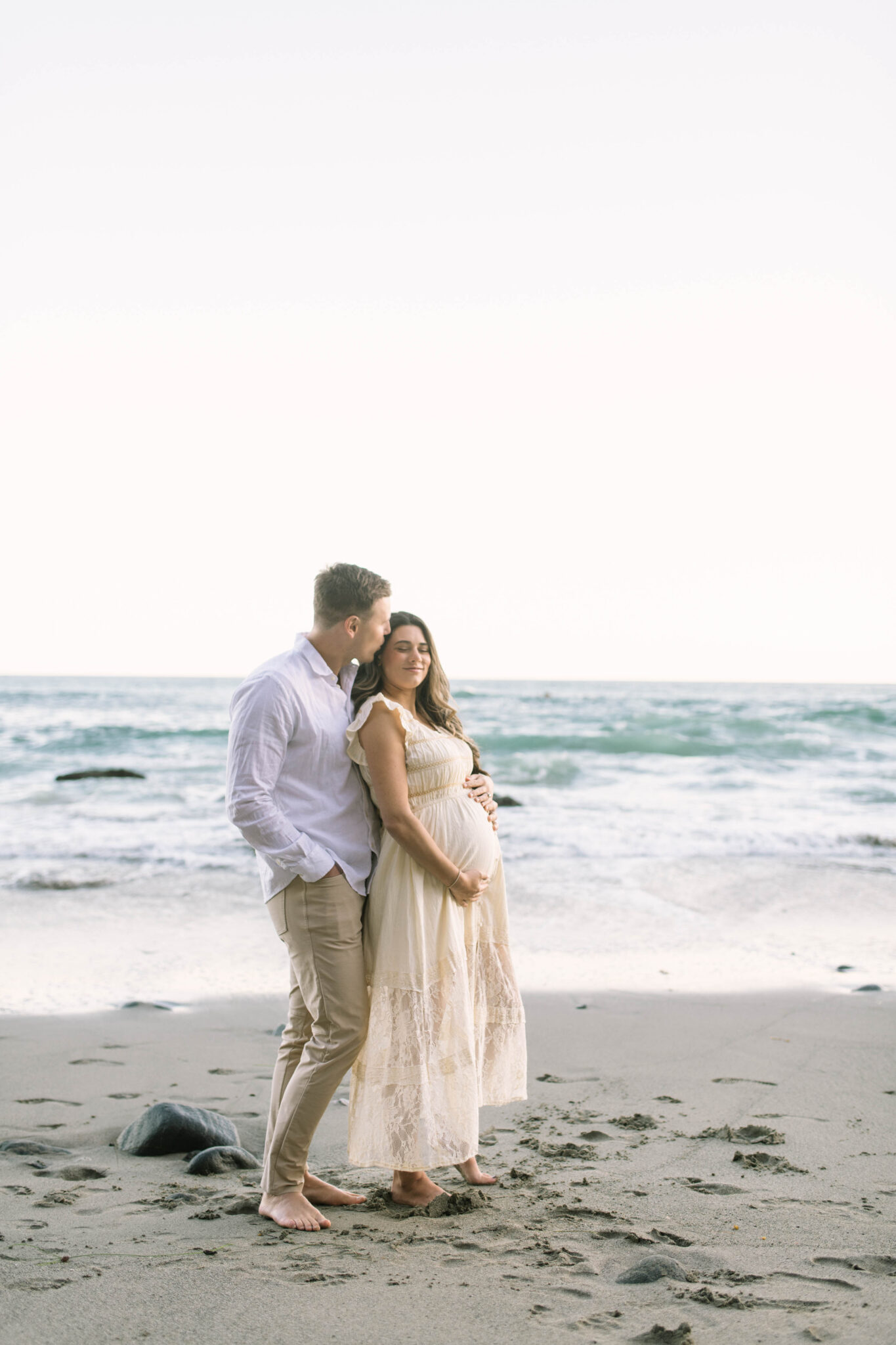 Beach maternity photo outfit, flowy tiered maxi dress.
