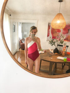 sidestroke swimsuit on a mom of three