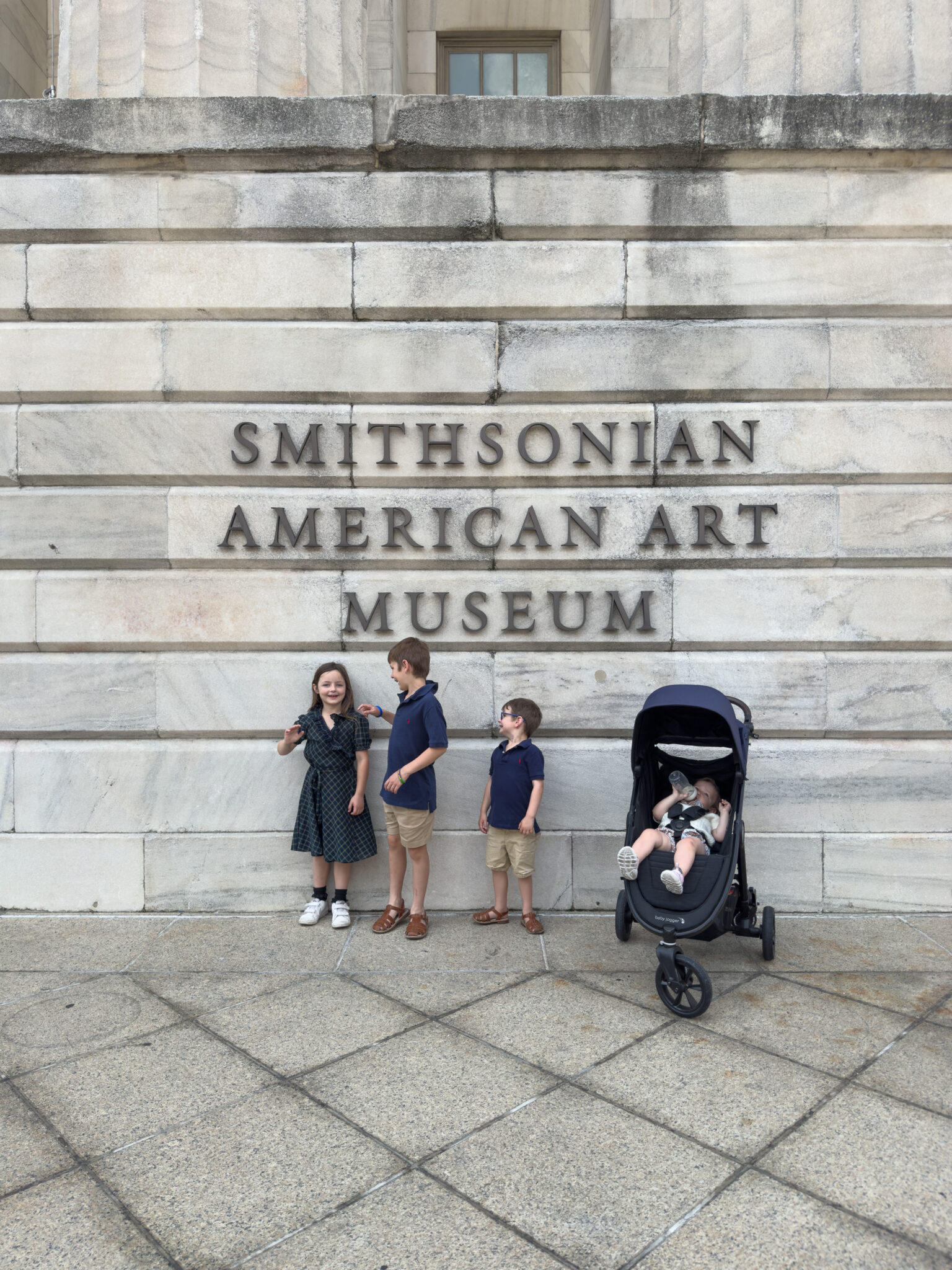 outside a museum with a great travel stroller on a budget