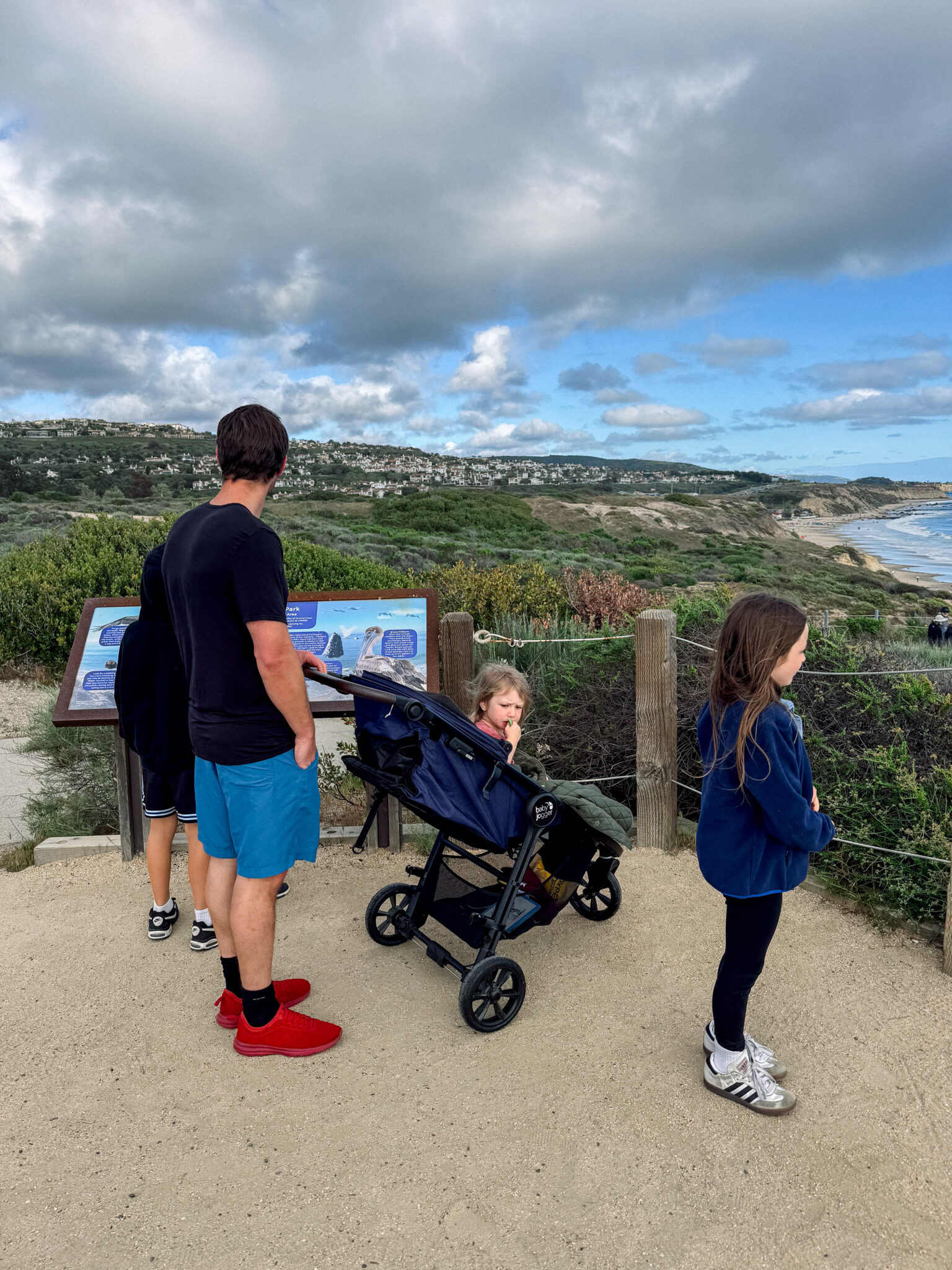 all terrain travel stroller on a hike by the beach