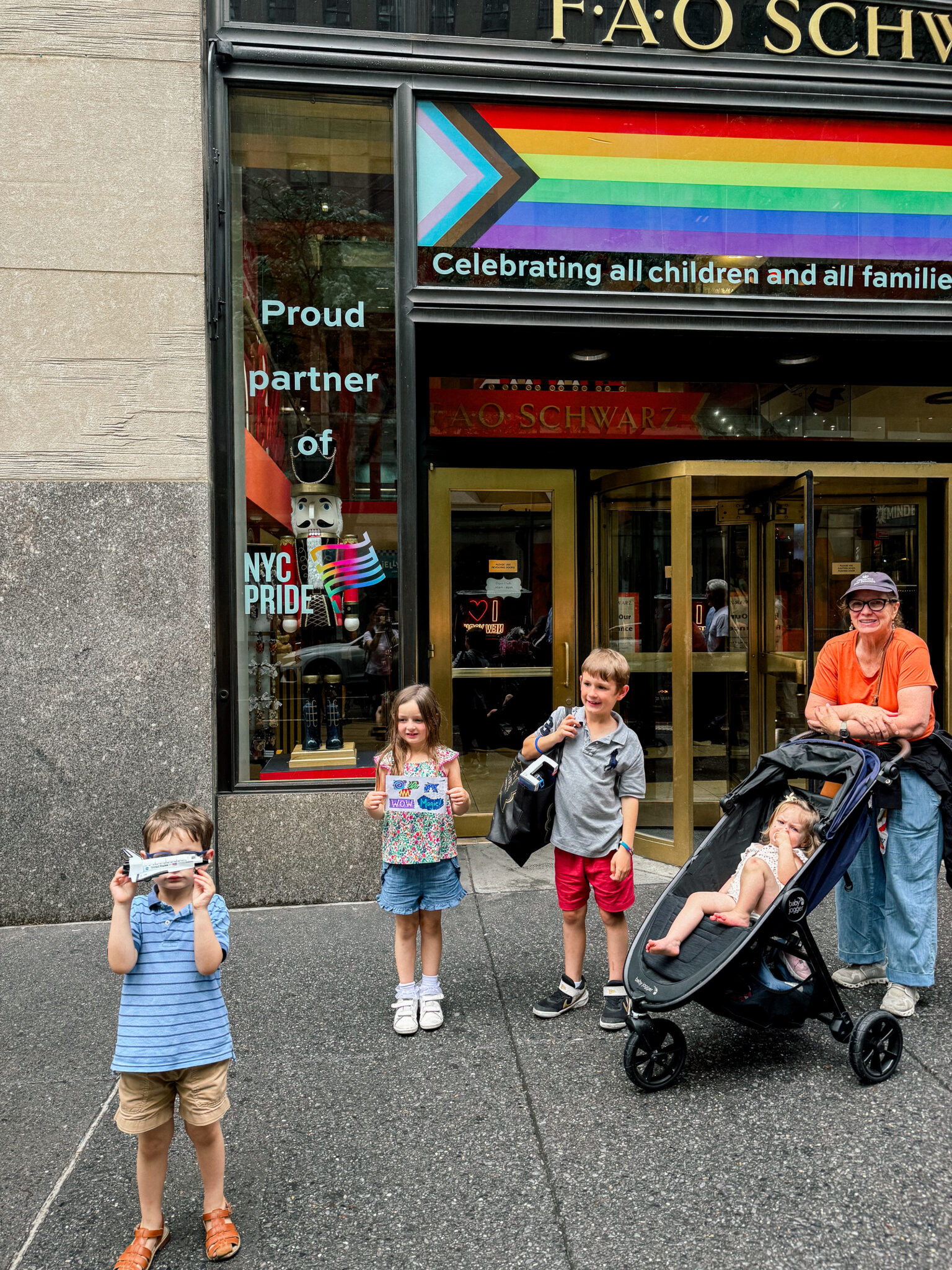 kids exploring nyc with baby and toddler in the travel stroller.