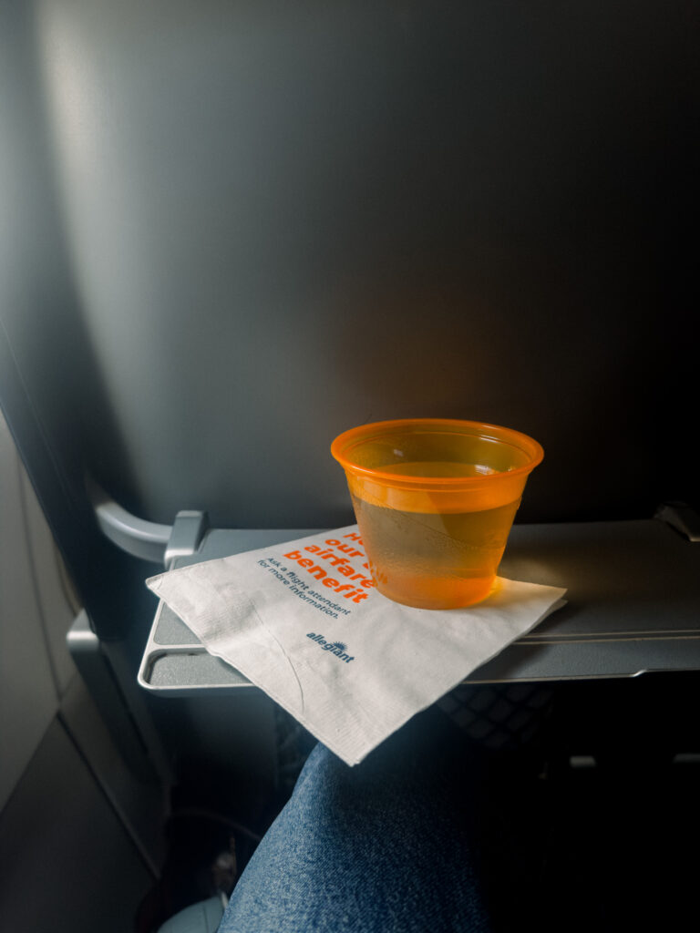 Allegiant free cup of water on an allegiant flight.